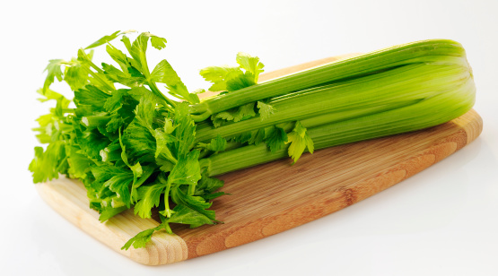 Celery on cutting board